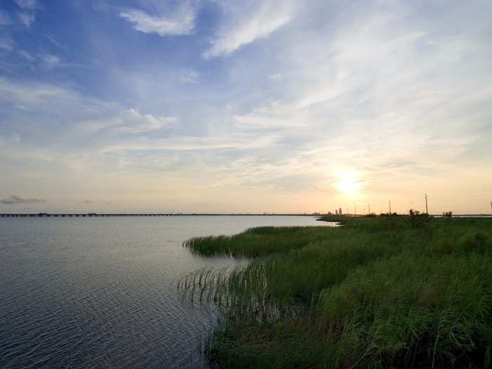 ALABAMA:  Mobile Bay bills itself as "secretly awesome," and its many tourist attractions prove this to be true. Attend the world's oldest Mardi Gras celebration, eat some fresh seafood, go kayaking and fishing, and take in the beautiful views of the Gulf of Mexico.