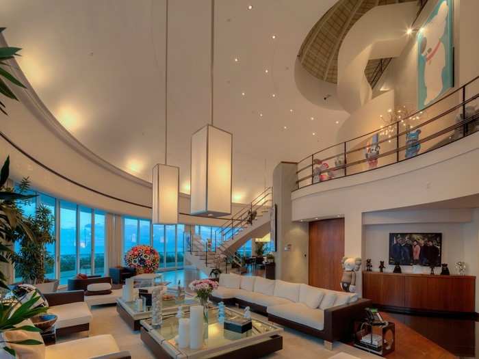 Pharrell Williams' penthouse definitely feels like his. The first thing you notice when you walk into the grand cathedral-like living room is the art on the walls by his favorite artists.