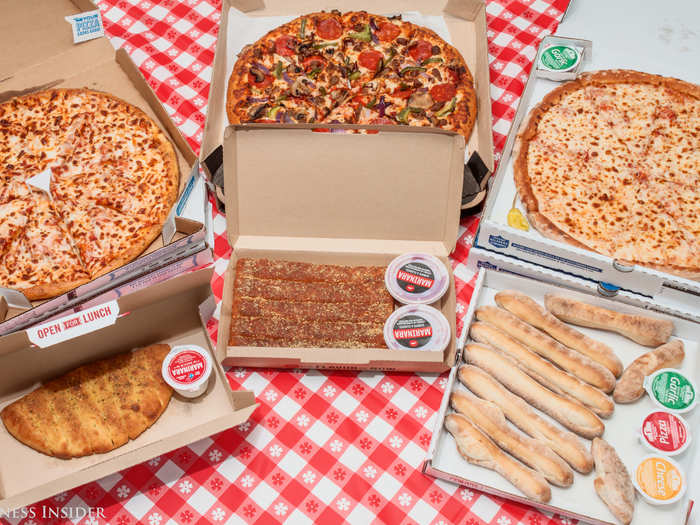 Our test has three categories: the classic cheese pizza, the supreme pizza, and breadsticks — the pizza palace essentials.