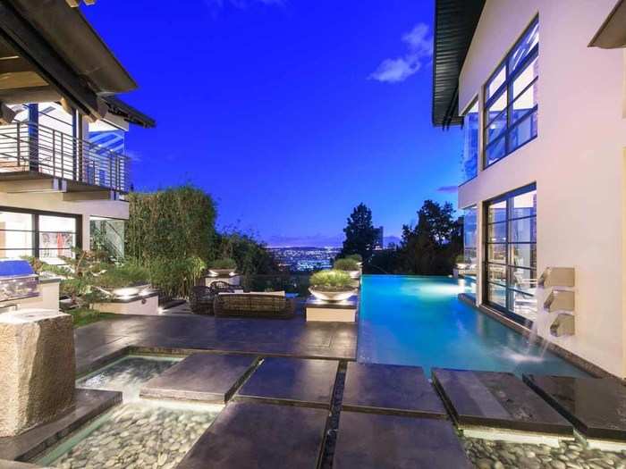 Set in Hollywood Hills West, just above the world-famous Sunset Strip, the 10,620-square-foot home boasts four bedrooms and seven bathrooms.