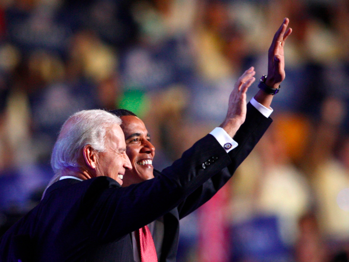 US President-elect Senator Barack Obama (D-IL) and Vice President-elect Joe Biden (D-DE) wave to supporters during their election night rally after being declared the winners of the 2008 US Presidential Campaign in Chicago on November 4, 2008.