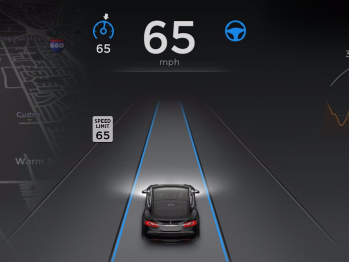 Tesla's Autopilot system is made up of multiple sensors placed all around the car. These sensors help the car understand its environment so that it can safely steer itself in most highway situations.