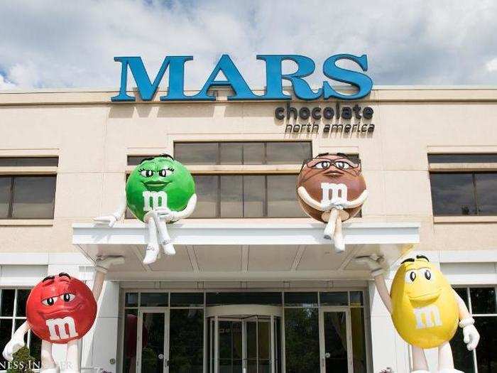 Four friendly M&Ms greet you at the main entrance of the building.