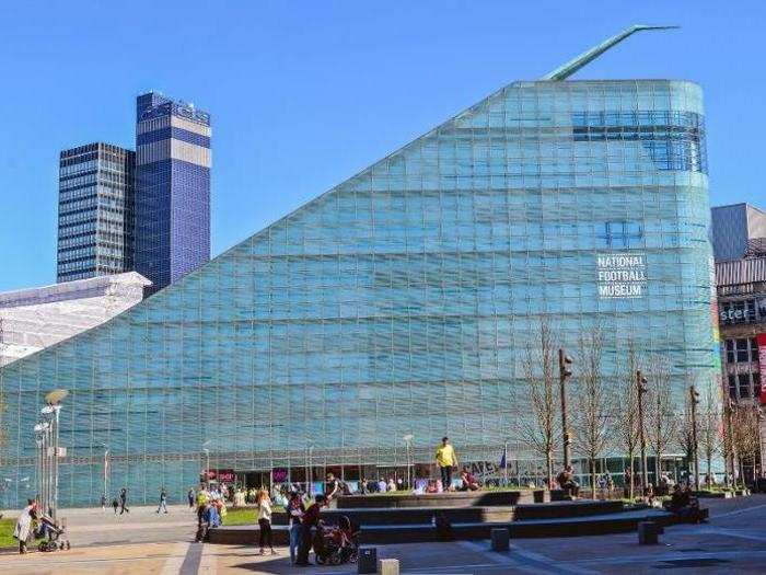 100. The slide-like Urbis building in Manchester, UK, contains a National Football Museum.