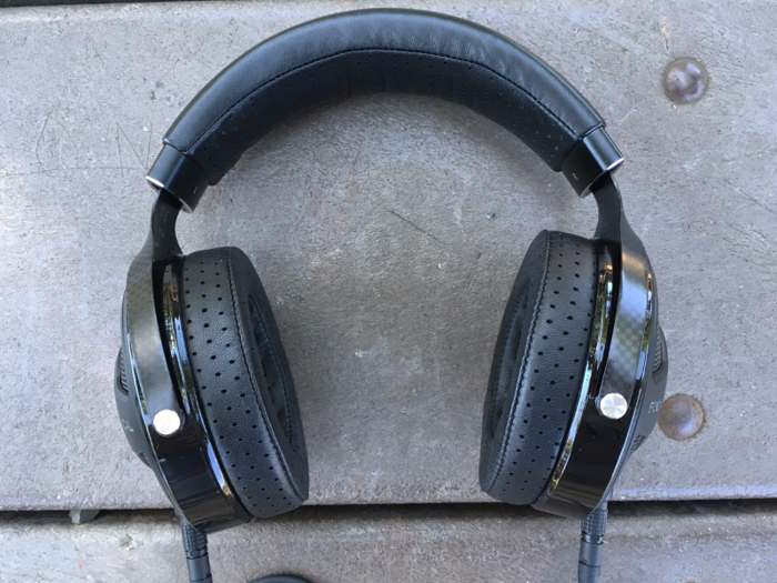 The Utopia looks good. It has a lot going on, what with its dimpled leather earpads, aluminum grills, and carbon fiber yoke, but it doesn’t come off as showy. The jet-black style helps it find a balance between “thing that costs $4,000” and “thing I’m not embarrassed to wear around people.”