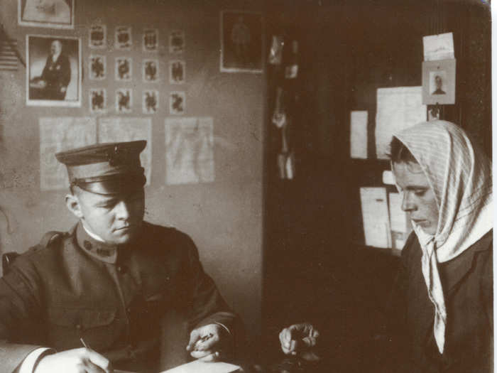 This photo from Ellis Island around 1910 shows an immigrant taking an intelligence test involving shapes. Tests like these were used to justify pseudoscientific racism and eugenics.