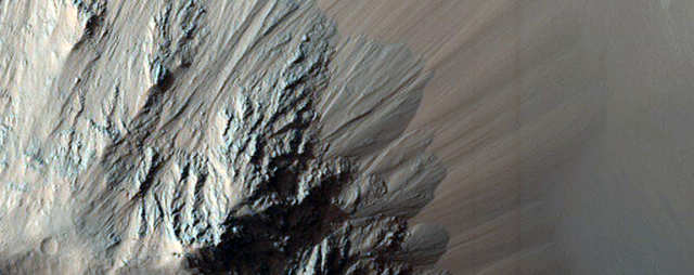 Eos Chasma is part of Valles Marineris, the largest canyon on Mars.