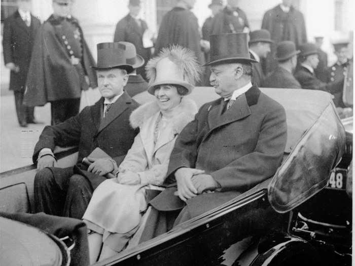 March 4, 1925: Grace Coolidge was all smiles in a gray dress and top hat to match Calvin Coolidge's during his second inauguration.