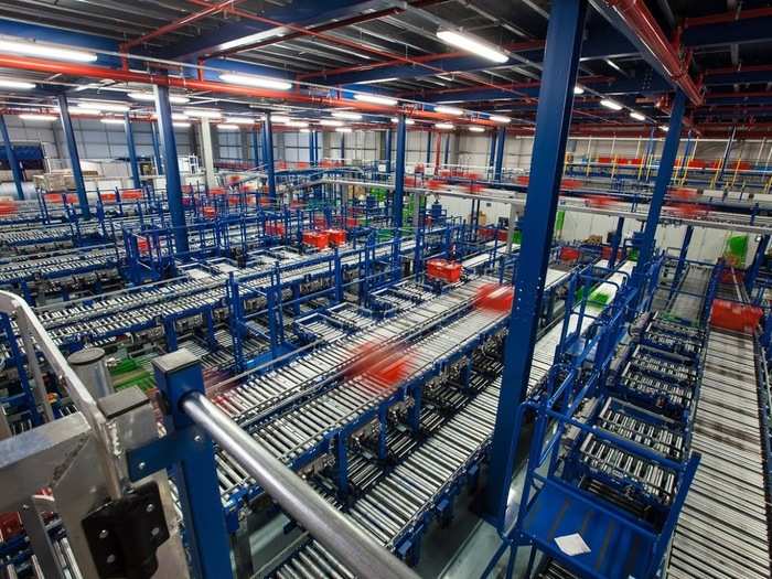 Located outside Birmingham, one of Ocado's warehouses measures 350,000 square feet and ships over 1.3 million food items per day to people's doors.