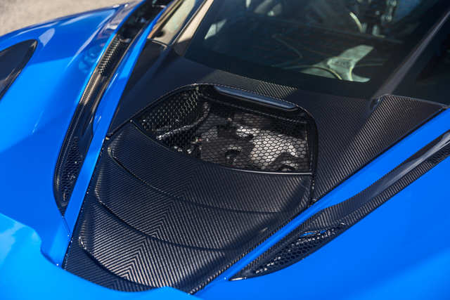 At the heart of the 720S is a new 710-horsepower, 4.0-liter, twin-turbocharged V8 engine. It features brand new turbochargers, intercoolers, cylinder heads, crankshaft, and pistons. The new engine is not only significantly more powerful than the previous unit, it also produces fewer harmful emissions. Unfortunately, you can't open the hatch to see the motor, but McLaren did decide to bathe the engine compartment in mood lighting.