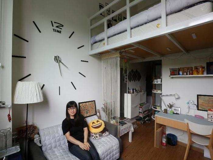 On the relatively luxurious side of things, development firms in China rent "youth" apartments to students and early-career workers in Shenzen. Here, a student demonstrates a unit with a coveted loft space.