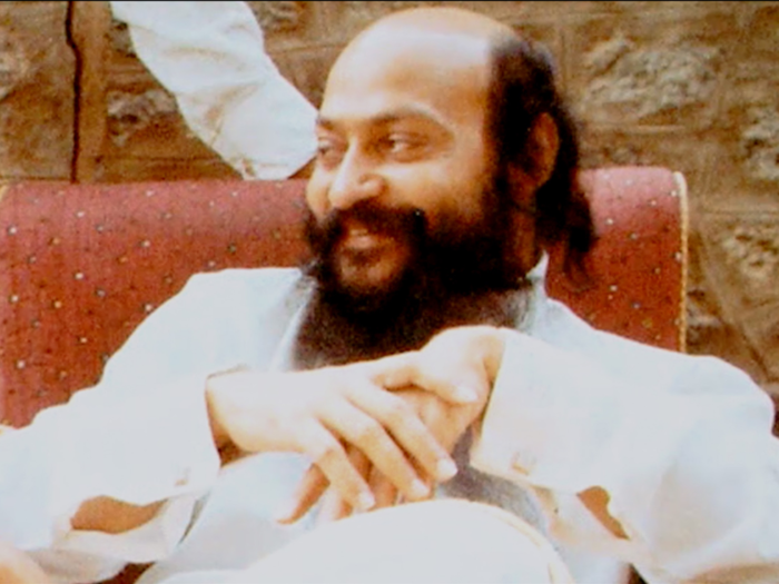 In 1970, Bhagwan Shree Rajneesh, also known as Osho, founded a spiritual movement and commune in Mumbai, India. His teachings — which featured "an odd mix of capitalism, meditation, ethnic and dirty jokes, and open sexuality" — earned him an international following and reputation as a "sex guru."