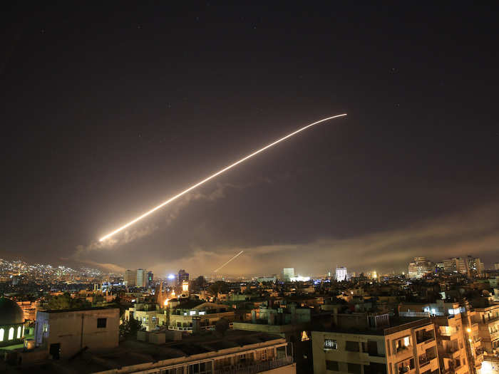 Missiles streaked across the sky above Damascus.