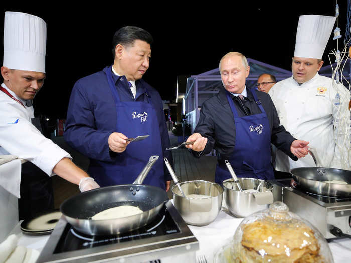 The two world leaders whipped up pancakes at the Eastern Economic Forum on Tuesday. Both countries are notorious for spreading positive propaganda about their leaders.