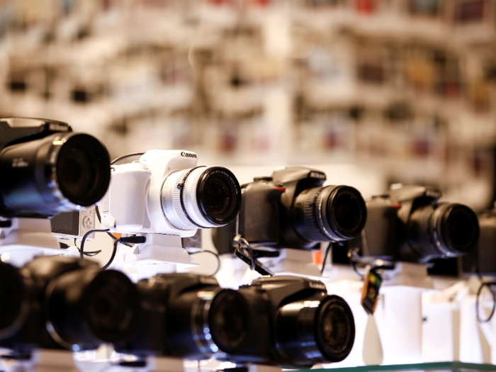 Before you decide anything, take a trip to a camera or electronics store and get a feel for the different cameras.
