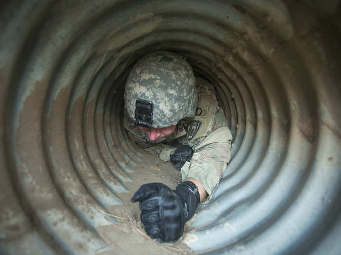 Crawling through a tiny tube.