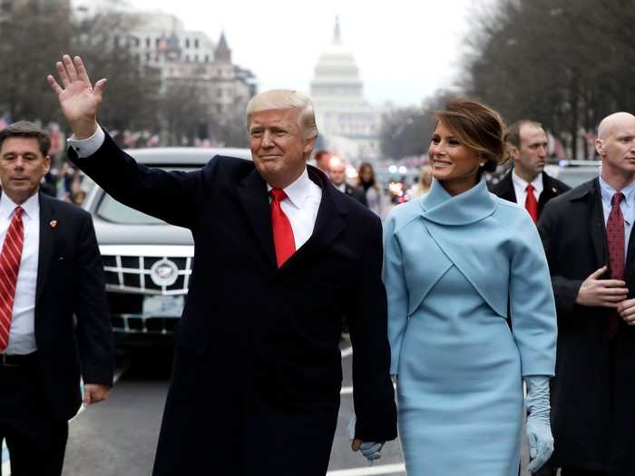 In her first moments as first lady, Trump made a striking appearance at President Donald Trump's inauguration ceremony, keeping warm in a powder-blue Ralph Lauren coat that drew comparisons to former first lady Jackie Kennedy.