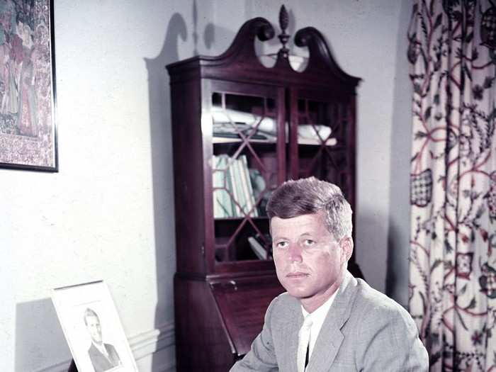 Kennedy was elected to the US House of Representatives in 1947 and the Senate in 1953, where he served until 1960. Then-Senator Kennedy is pictured here at his desk in Boston, Massachusetts in August 1956.