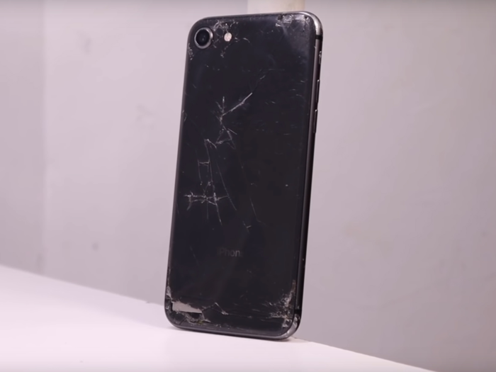 This is what he started off with. A black iPhone 8 with a cracked back and cracked screen.