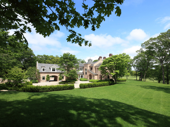 The house sits on five acres of land and is adjacent to The Country Club, a historic country club in Brookline, MA.