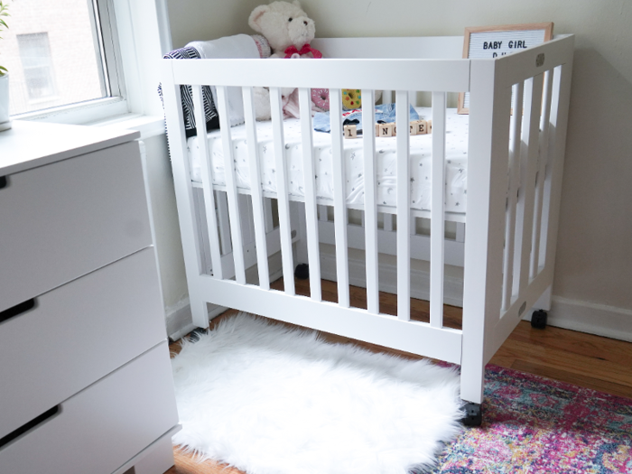 A space-saving crib that is both mobile and portable