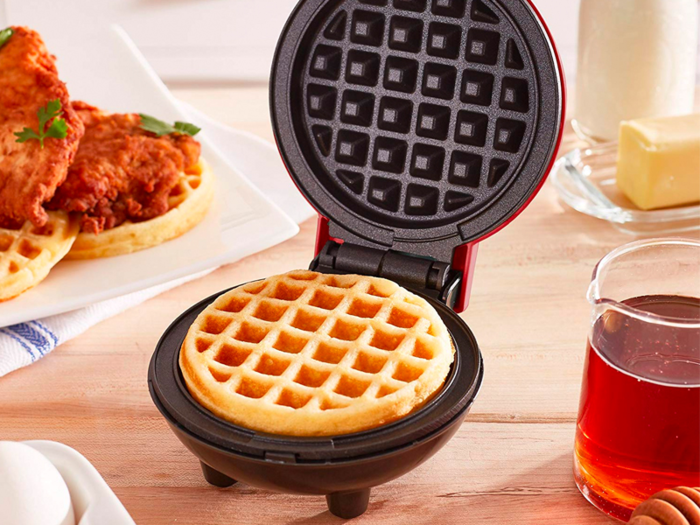 A mini, functional waffle maker that takes up minimal countertop space