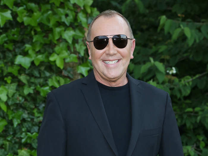 Michael Kors started designing clothes in his childhood and has since turned the passion into a global fashion empire that contributes to his current estimated net worth of $600 million as of 2018.