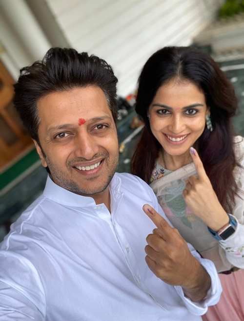 Ritesh Deshmukh and wife Genelia cast their vote during Maharashtra assembly elections in Mumbai: IANS