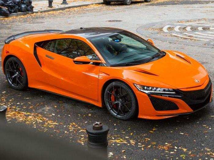 The Acura NSX is a reboot of the legend from the 1990s, but this mid-engine masterpiece is thoroughly new, and with its sleek lines, gathered more attention in my driveway than almost any other car I've tested. Built in Ohio, the NSX was designed by Michelle Christensen.