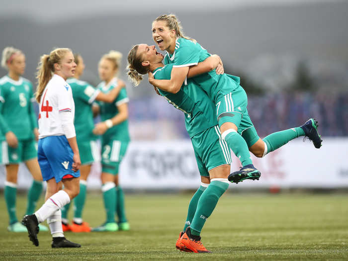 Alexandra Popp and Verena Schweers of Germany celebrate a Women's 2019 FIFA Women's World Championship Qualifier match in Torshavn, Denmark.