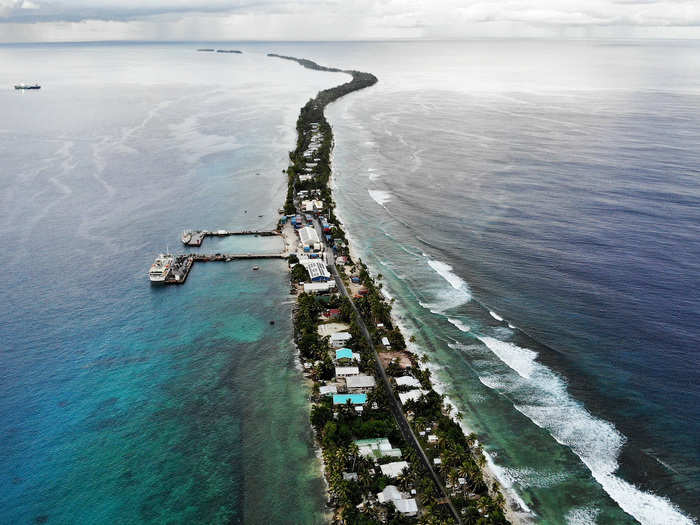 For some, living in the Pacific is like walking on a knife's edge. This is Funafuti, the capital of Tuvalu, the world's fourth-smallest country.