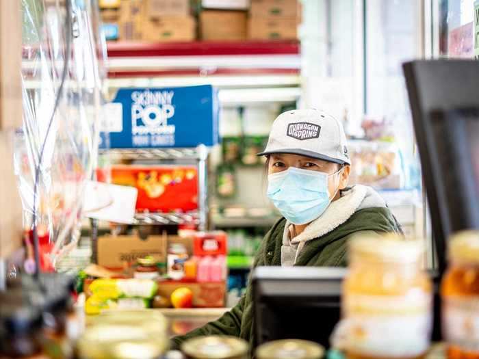 Fiona Wang is a cashier at Apple Farm Market in Vancouver. She works tirelessly to keep her store safe and sanitary for customers.