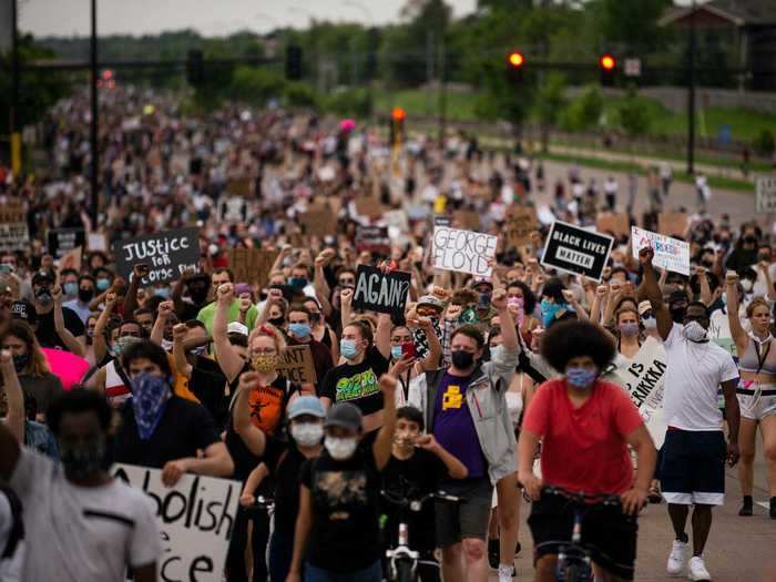 Thousands of protesters took to the streets of Minneapolis on Tuesday to demand justice and protest the police killing of George Floyd, a 46-year-old black man.