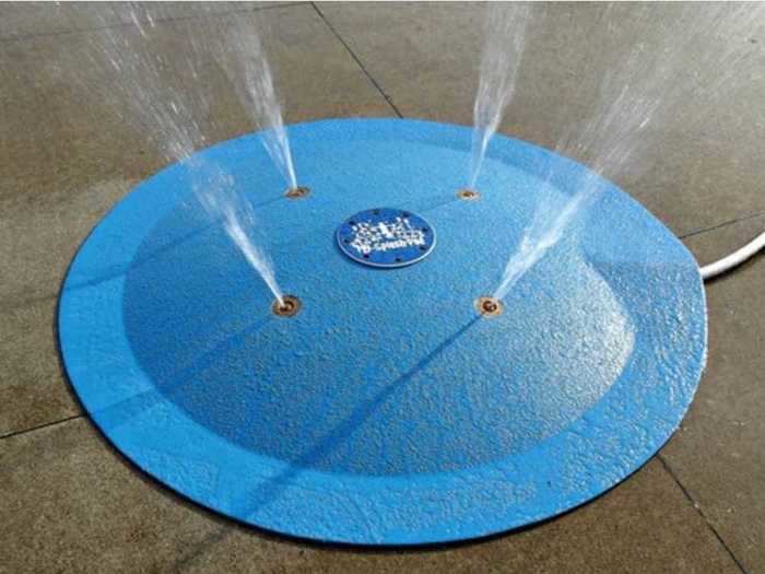 Set up a splash pad for that at-home waterpark feel