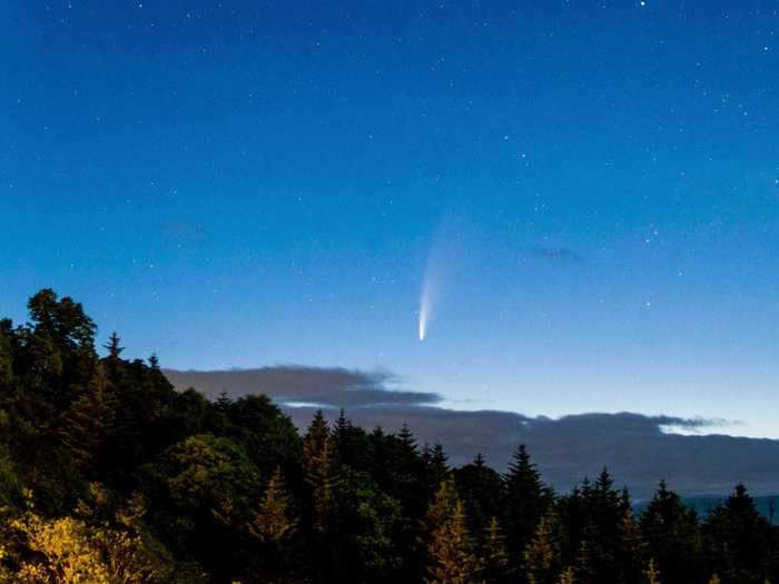 The huge comet is gracing night skies all over the world with its brilliant flare as it makes its way past Earth this month.
