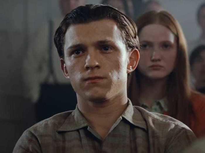 Tom Holland plays Arvin Russell, a young man devoted to protecting those he loves.