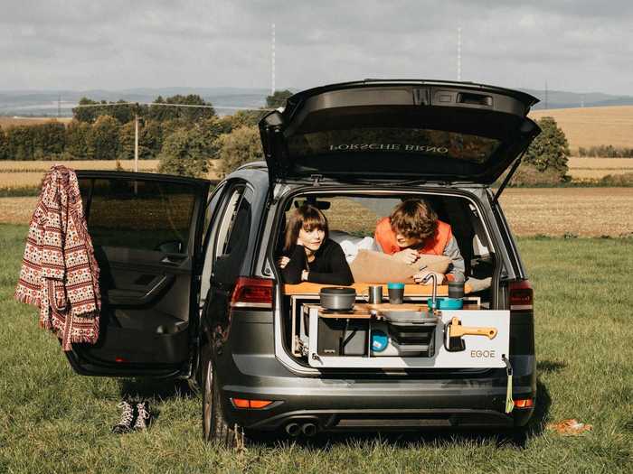 The Camper — which costs up to almost $3,290 — can be used while the second row of seats is up, but when it's bedtime, the trunk and back row can be transformed into a bed that can sleep two.