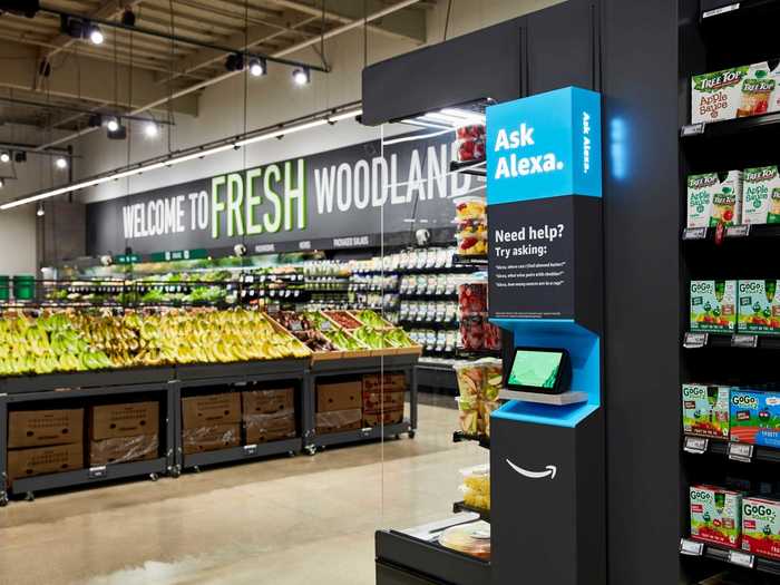 Amazon said its new Amazon Fresh store will offer low prices on products from national brands, as well as Whole Foods' private label, 365 by Whole Foods Market.