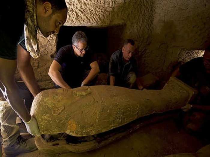 The first finding that Egypt's Ministry of Tourism and Antiquities announced was a set of 13 sarcophagi found at the bottom of a 36-foot-deep shaft.