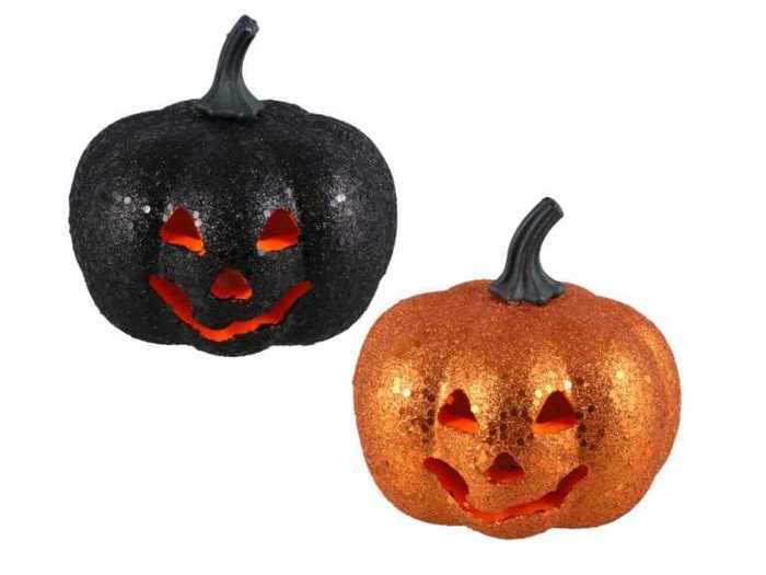 Dazzle guests with a set of glittering jack-o'-lanterns.