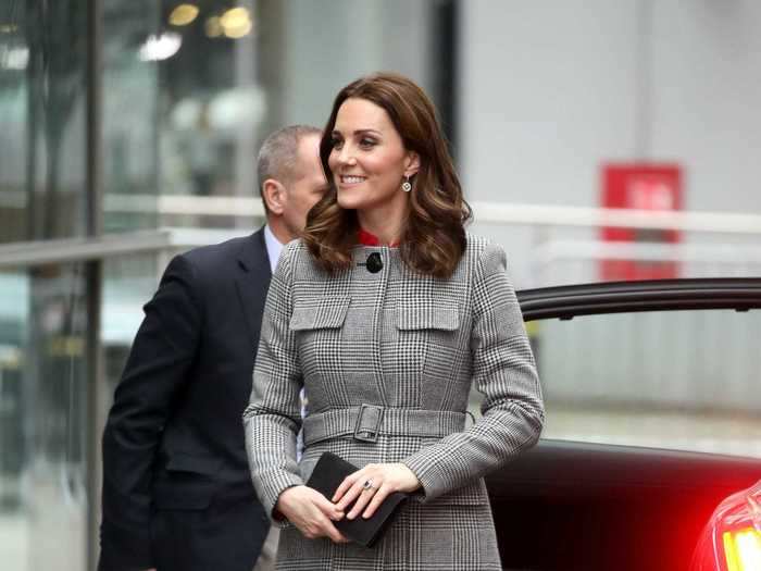 During a visit to the Children's Global Media Summit in December 2017, Middleton wore a simple black-and-white L.K. Bennett belted coat.