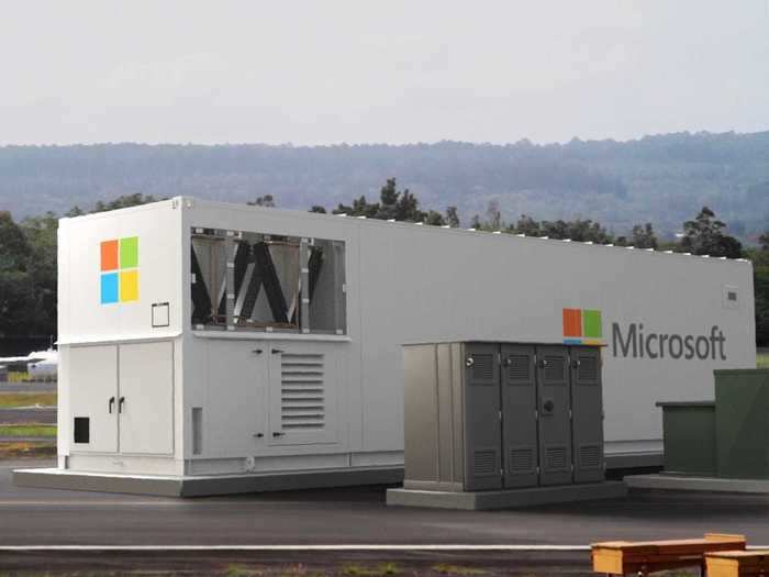 The data centers look like shipping containers, with Microsoft's logo on them.