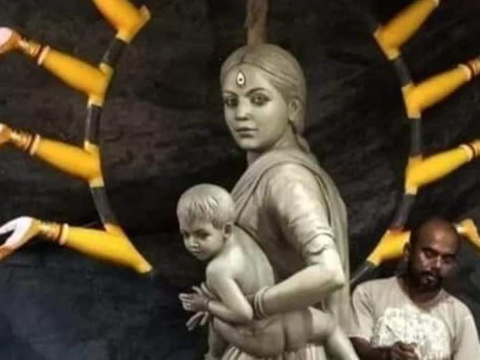 ​Barisha Club Durga Puja in Behala has installed an idol of Ma Durga as a female migrant worker with her children — Saraswati, Lakshmi, Kartik and Ganesh.