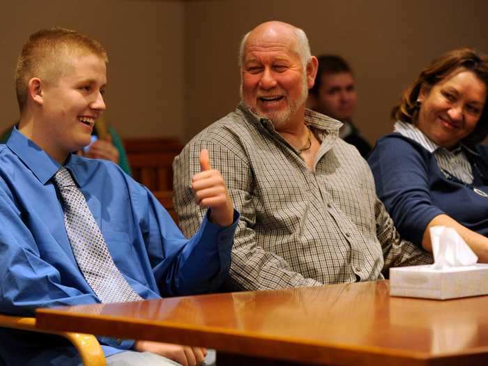Deryck Blake gave the judge a thumbs up as his adoption papers were finalized.