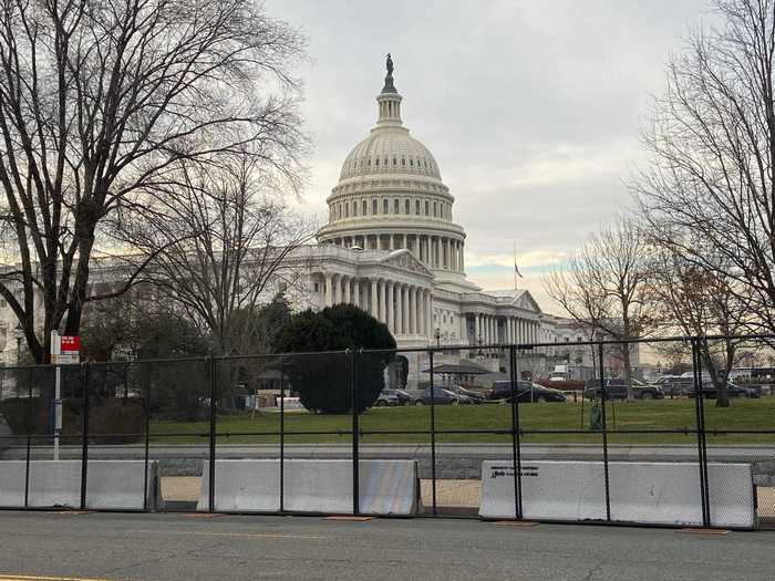 A tall, black fence with concrete barriers at the base now surrounds the entire Capitol grounds, with only a couple entrance points. Normally, the grounds are open to the public.