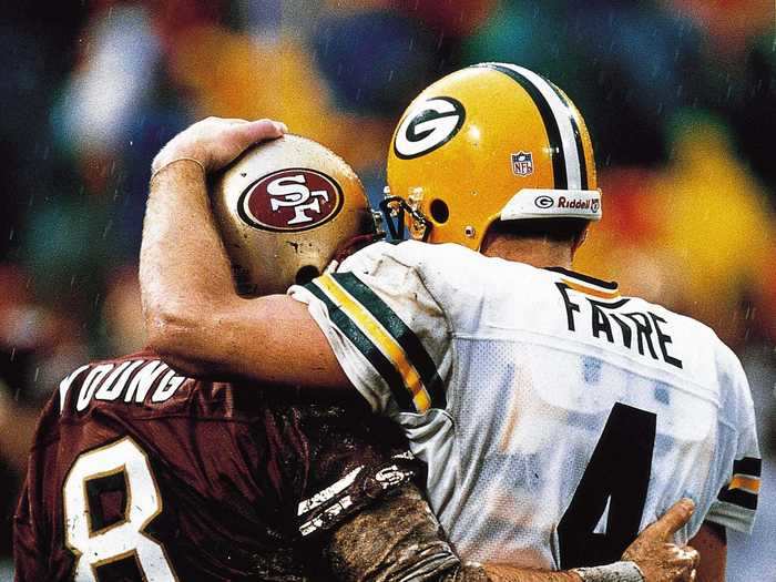 Steve Young and Brett Favre stood arm in arm after the Green Bay Packers beat the San Francisco 49ers in 1998.