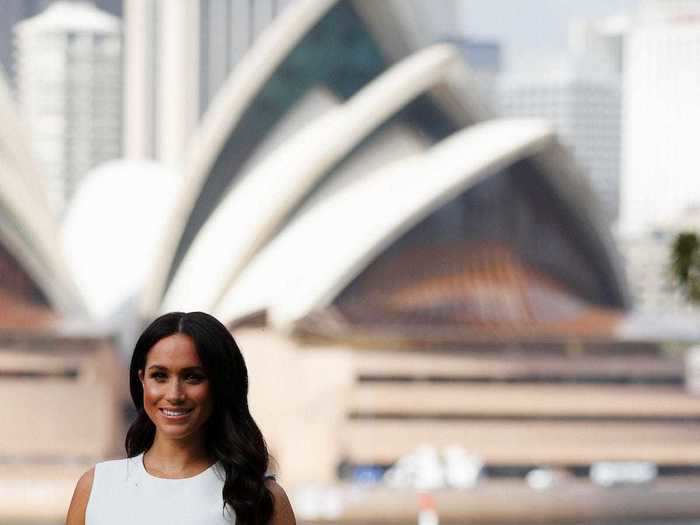 For her first appearance after announcing she was pregnant in October 2018, Markle opted for a sleeveless white dress by Karen Gee.