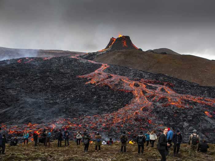 A long-dormant volcano that erupted about 25 miles from Reykjavik has continued to draw large crowds this week.