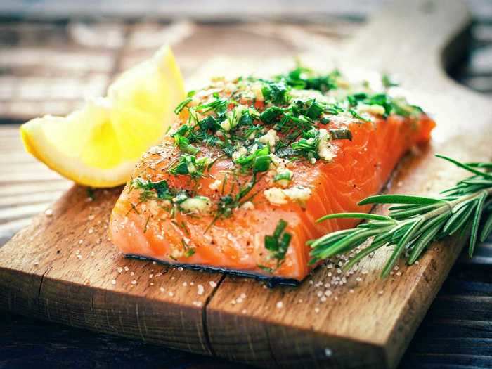 Adding plenty of herbs is a quick and easy way to give your salmon tons of flavor.