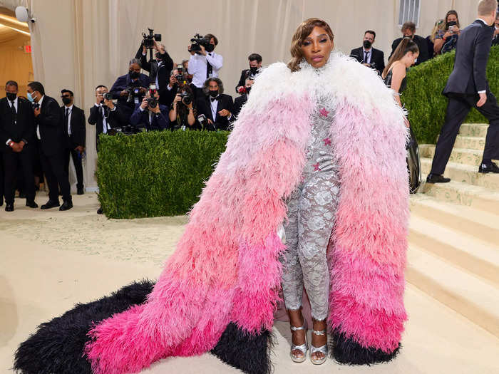 Serena Williams wore a silver Gucci bodysuit under her feather-laden cape.